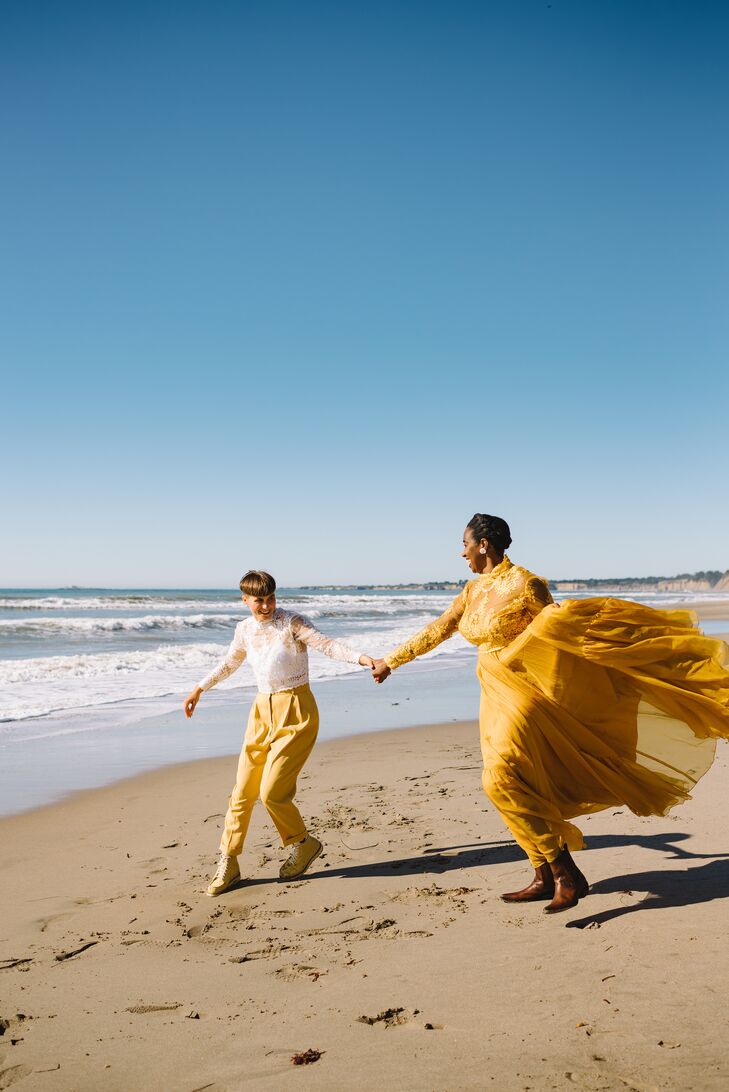 Bride in Canary Yellow Two-Piece Gown With Partner in Lace Top & Slacks on Beach