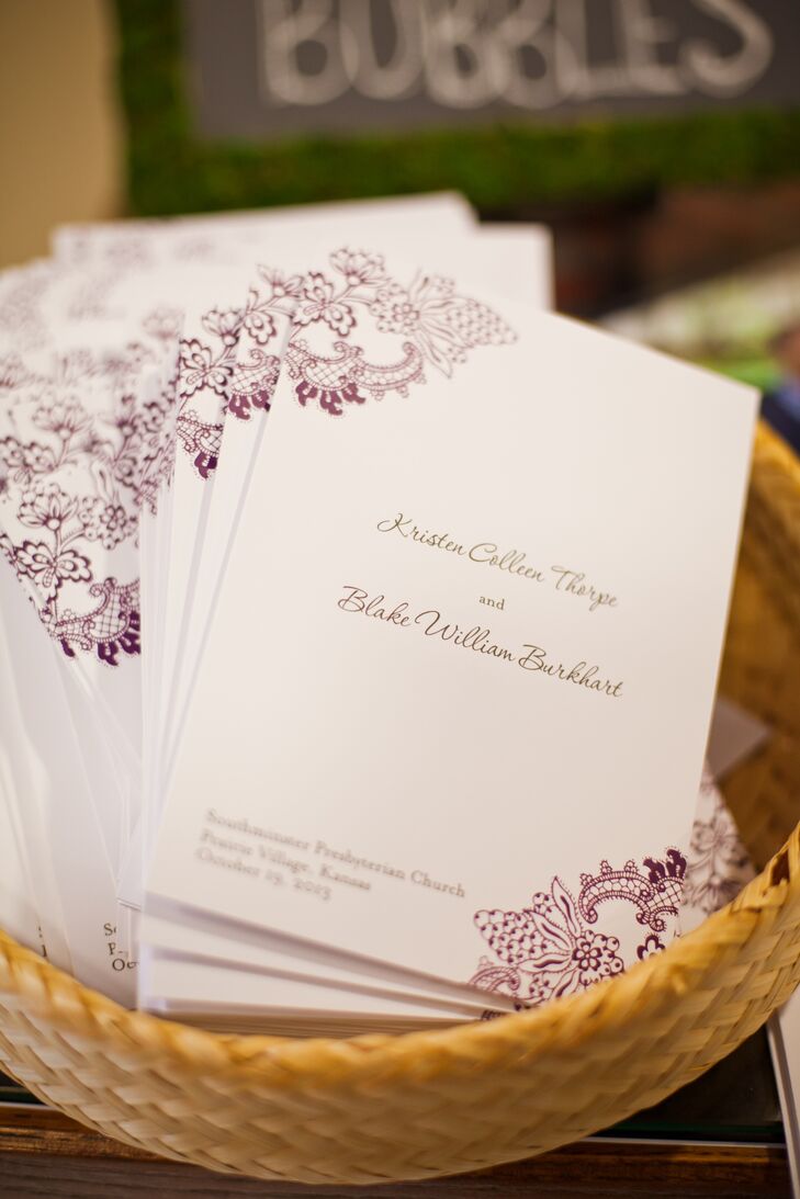 The ivory programs had an elegant damask design printed in aubergine ink.