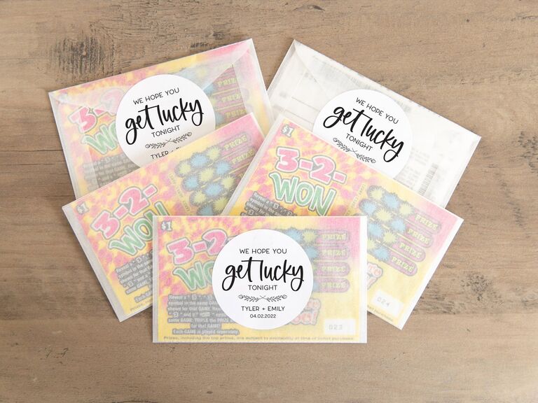 Lottery tickets with stickers that say "We hope you get lucky tonight"
