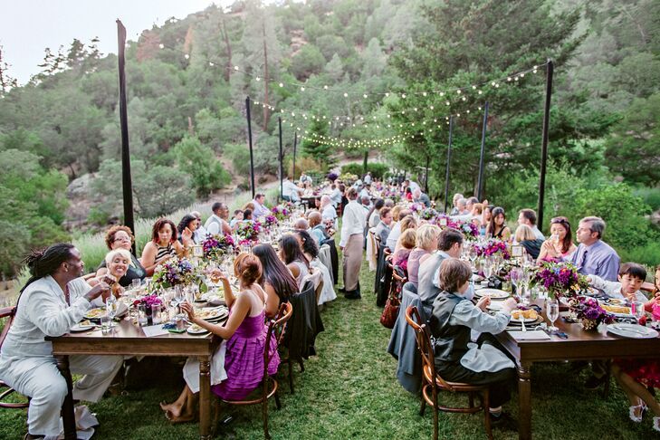 Market lights were strung over the 12 farm tables, which were left bare for a relaxed touch. "We let the flower and paper goods make the color statement," Kimberly explains.