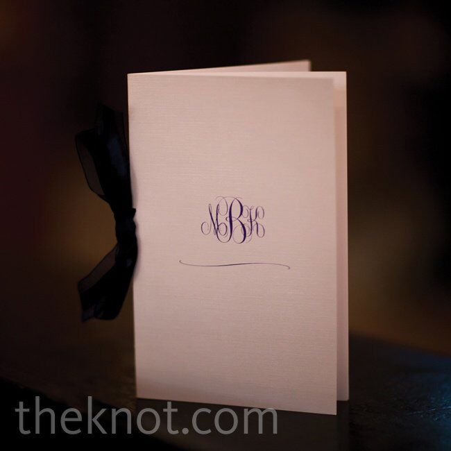 Simple white booklets adorned with a cursive monogram contained all of the ceremony details.