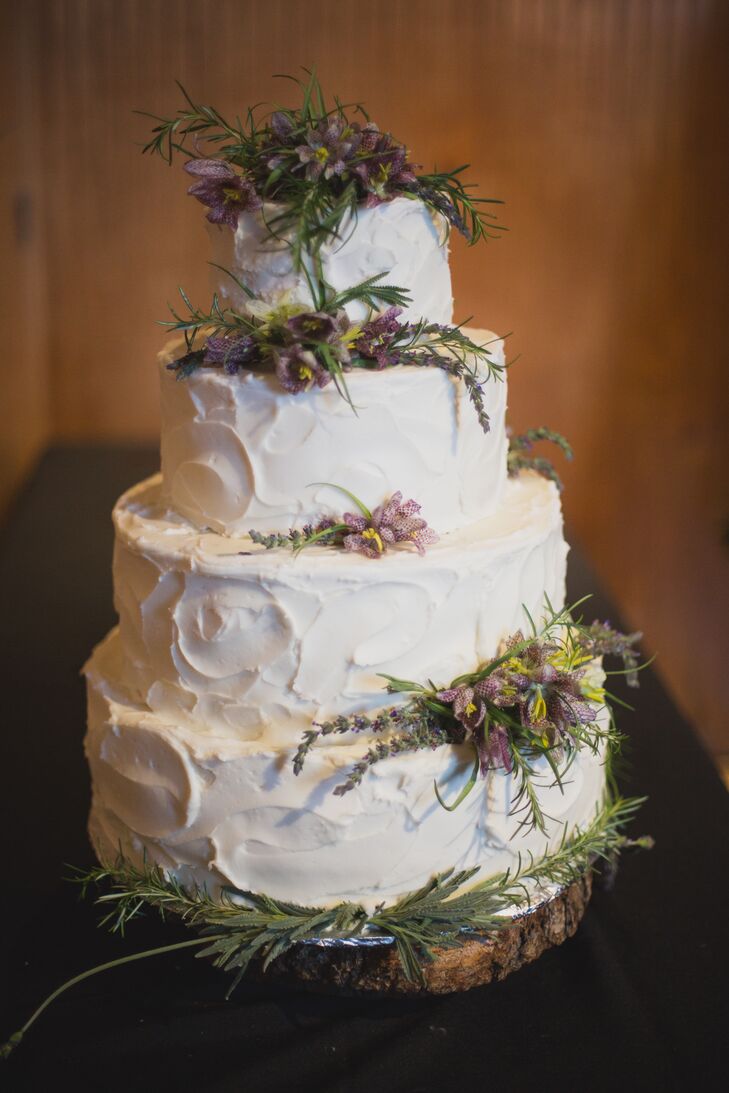 "Our guests loved being in such an unconventional space," Tess says. "The reception wasn't seated, and there were three areas to explore: indoors, outdoors and the Inner Sanctum upstairs. Quirky furniture and chandeliers rented from Pret a Fete gave the outdoor space an enchanted garden-party vibe."