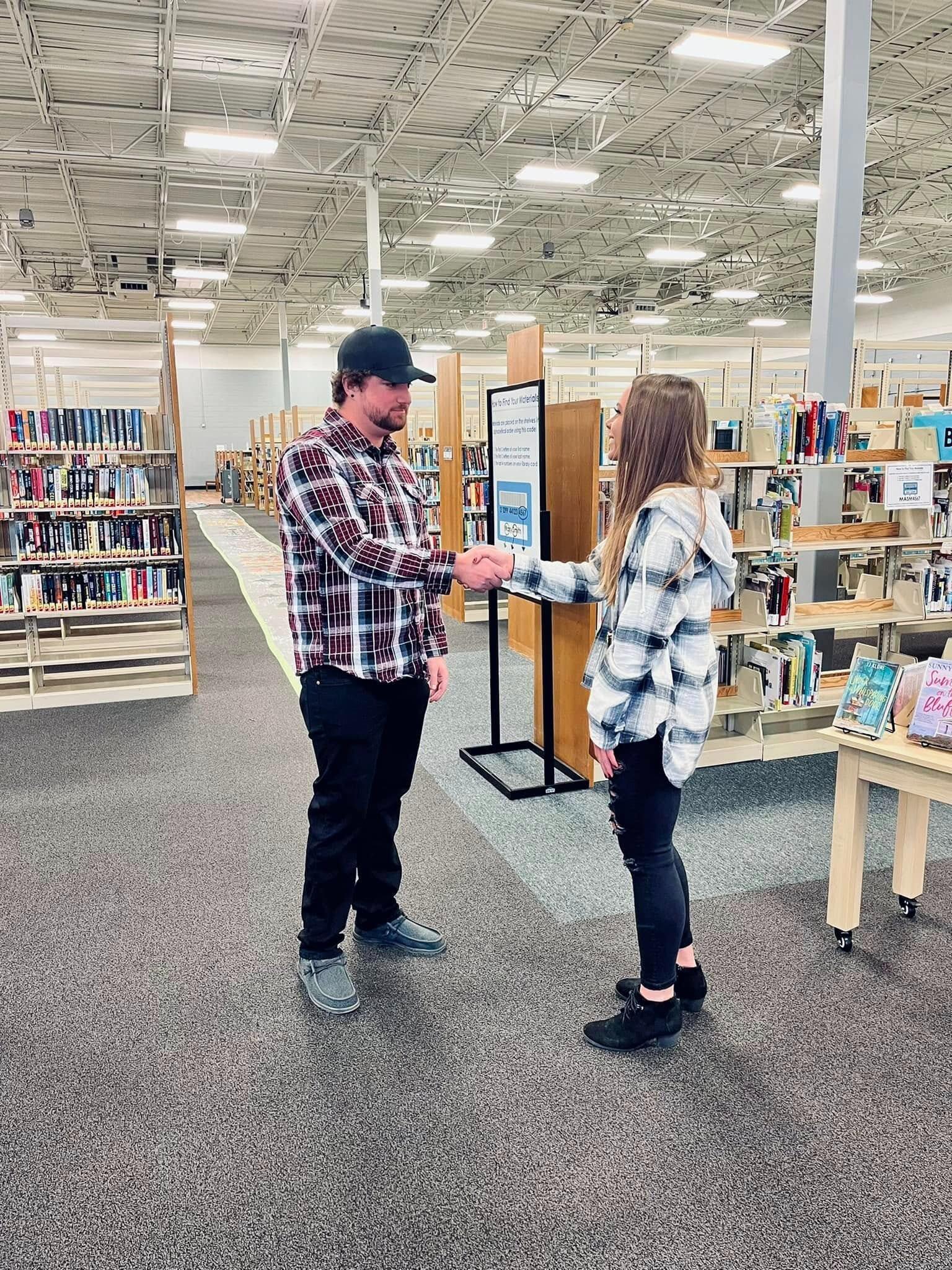 We met at Best Buy in Appleton.

At the time, Justin was the Sprint rep, and Lauren had just started as the mobile supervisor. We spent almost 40 hours a week working together in the mobile department for about a year, but despite what this story probably sounds like, there was absolutely no dramatic workplace romance happening. No flirting. Very professional. Extremely normal coworkers.
