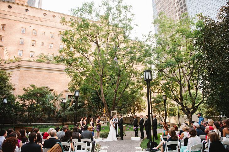 The small and simple celebration combined the sophisticated bridal party looks with homespun antique alter decor.