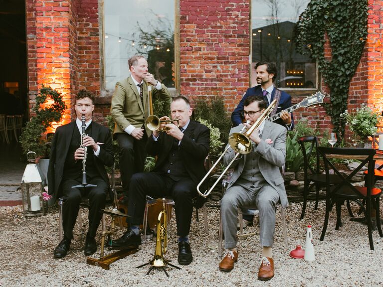 Jazz band playing at an outdoor venue.
