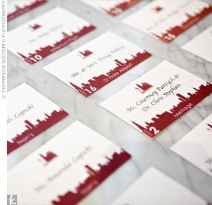 For a playful look, Carrie and Rob had their escort cards printed with the same city skyline motif used on their other stationery.