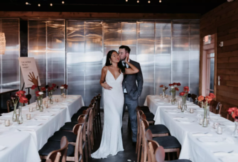 Fashionable Couple at Rehearsal Dinner, Long Tables, White Linens at Vietnamese Restaurant
