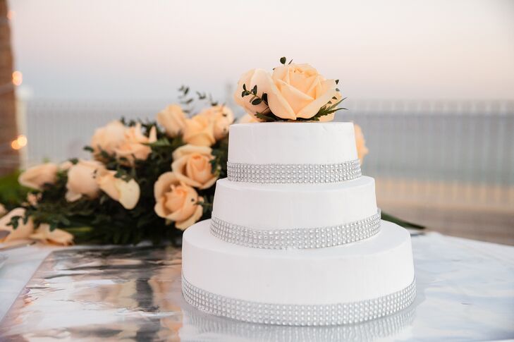 Tiny crystals wrapped around each tier of this three-tier cake added a gentle touch of sparkle to this modern design.