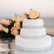 Tiny crystals wrapped around each tier of this three-tier cake added a gentle touch of sparkle to this modern design.