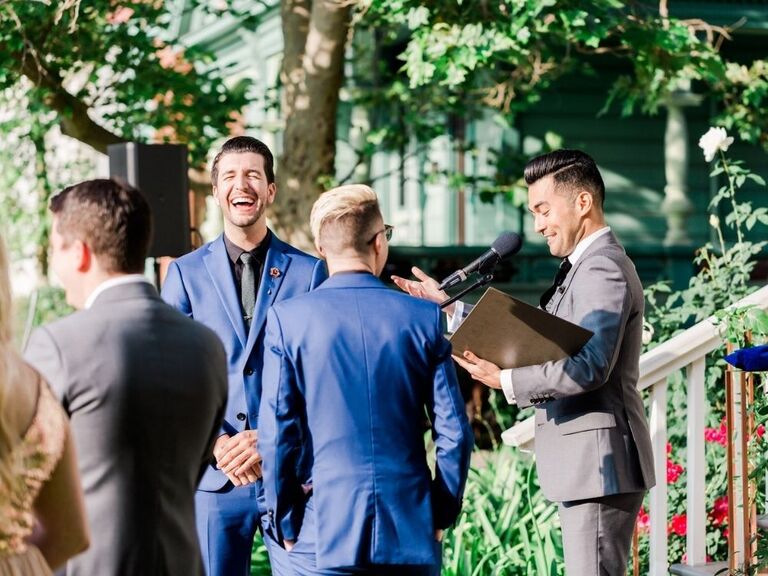 groom laughing during wedding ceremony