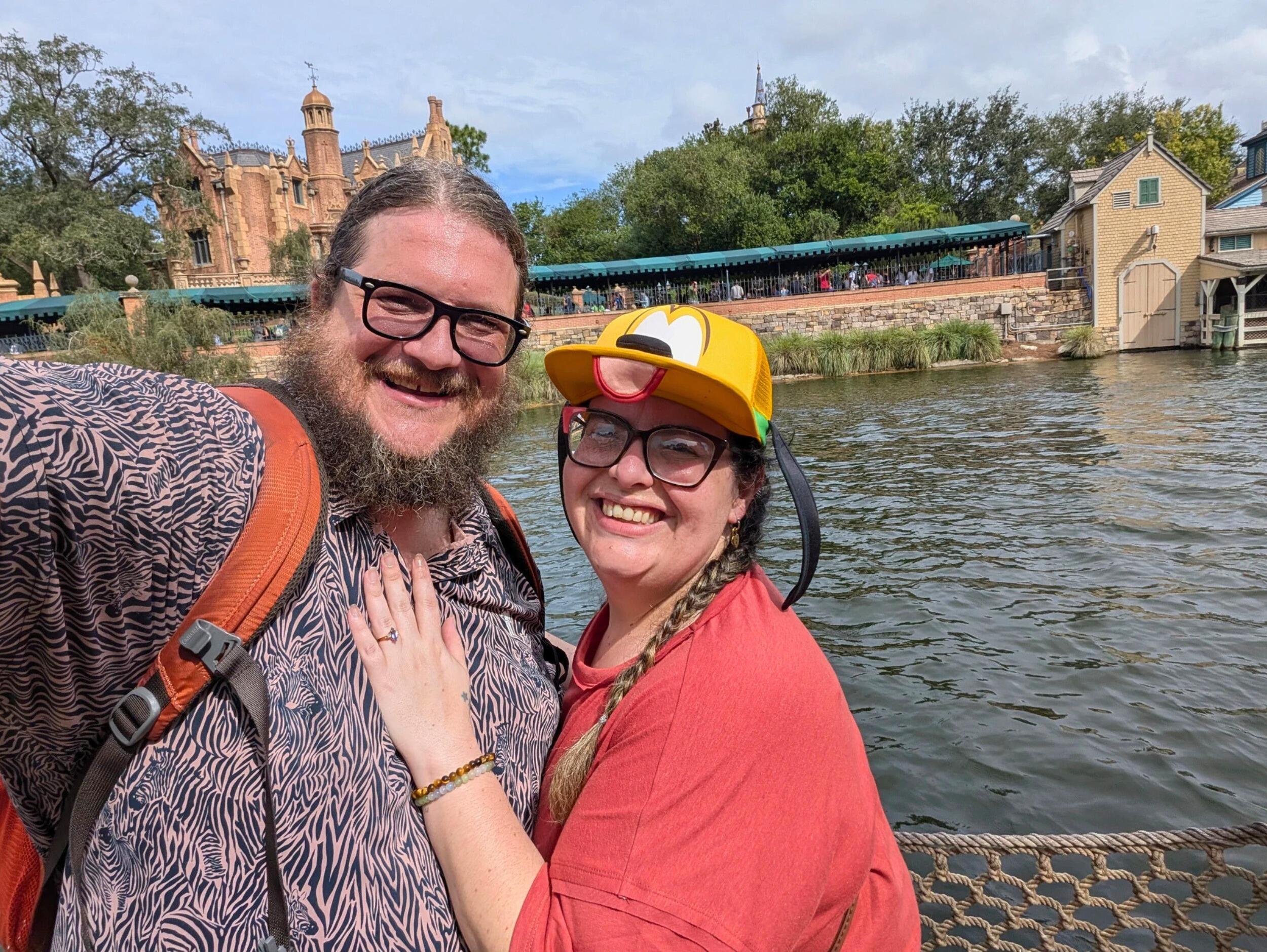 This time, Justin made sure it was for real. On the barrel bridge of what was once Tom Sawyer Island, he got down on both knees (yes, both 😂) and asked Kat to marry him. Since she'd already been through two practice proposals, she naturally spent the next five minutes questioning him before finally saying, "YES!" Even the Haunted Mansion guests across the water were cheering them on.