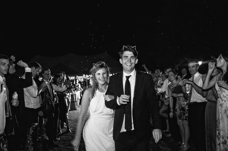 Before they left the reception, Caroline and Christopher made one last memory with friends and family members, complete with cat ears. Everyone blew bubbles as they made their way to the white Rolls-Royce exit car.