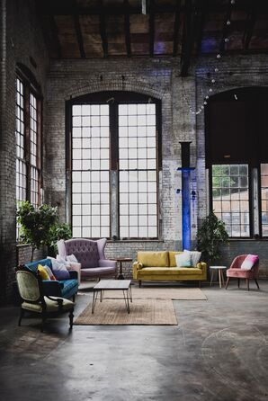 Lounge Set-Up at Industrial, Colorful Reception With Sofas and Chairs