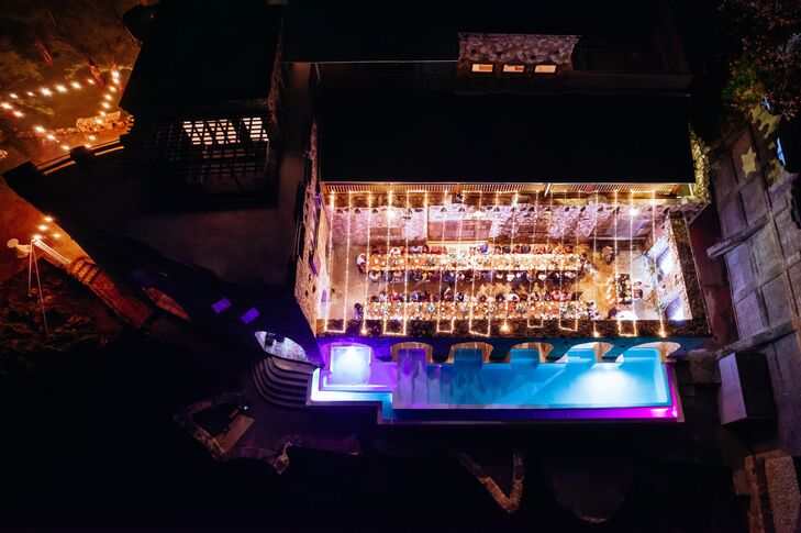 Drone Shot, Castle Venue at Night, Outdoor Courtyard Reception, Pool, Uplighting, String Cafe Lights at Pattoo Castle in Jamaica