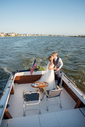 Newlyweds Exiting Ceremony on Vintage Boat