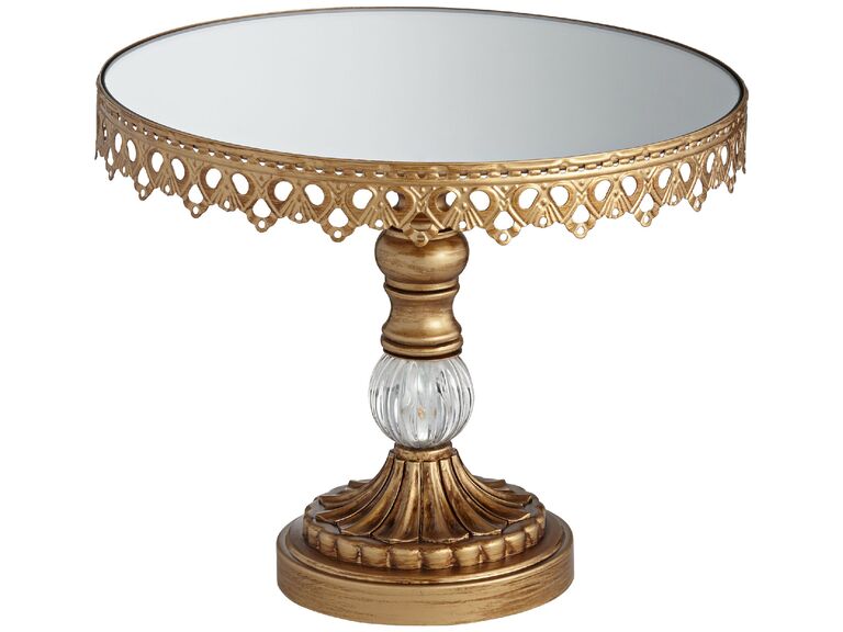 Elaborate gold wedding cake pedestal with mirrored cake plate