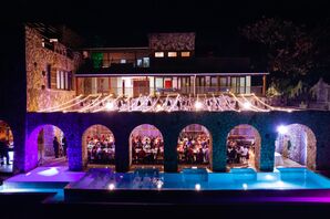 Pattoo Castle in Jamaica at Night Reception, Uplighting in Pool, Cafe String Lights, Fantasy Wedding