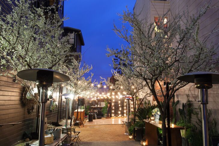 While everyone ate dinner indoors, the courtyard was flipped for dancing and vintage sofas and chairs were added so guests could relax. "We even lit a firepit for warmth and had a 'Spike your Own' hot chocolate and coffee station with flasks of Bailey's and Kahlua," says Lauren.