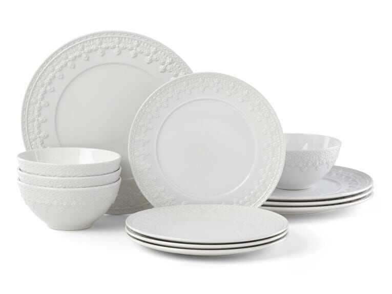 Elegant white set of plates and bowls. 