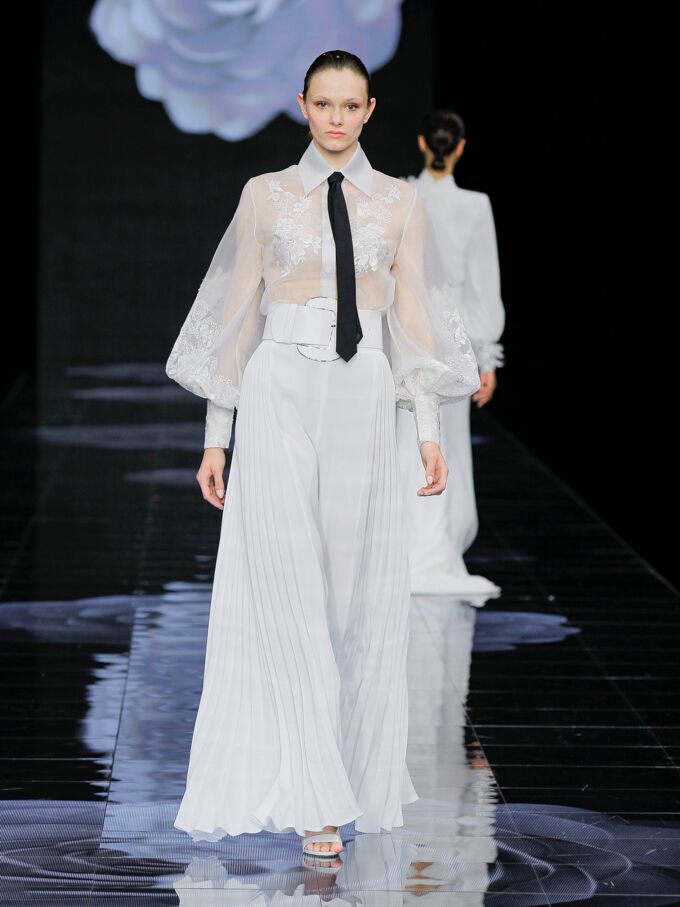 Model wears a bridal look by Spanish designer Isabel Sanchis. 