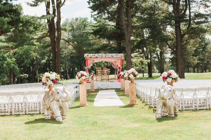 The colorful peach, pink and orange-hued outdoor Hindu ceremony was held at the Deerfield Country Club.
