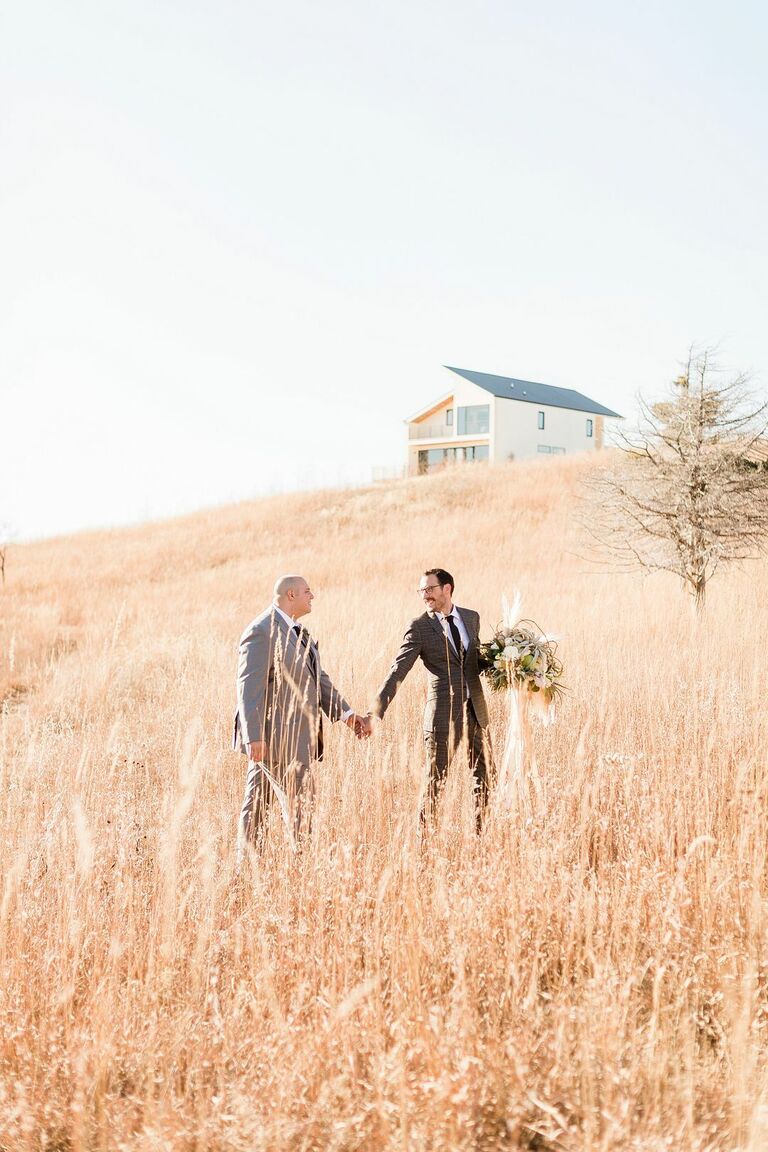 Wedding portraits in a field of grass