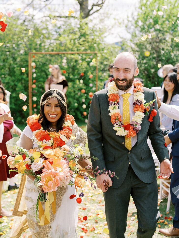 Couple Wearing Jai Mala Flower Garlands During Recessional