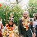 Couple Wearing Jai Mala Flower Garlands During Recessional