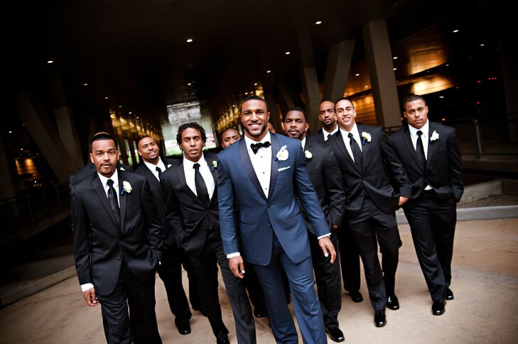 Ryan wore a handsome navy tux with a black bow tie, while the groomsmen all looked classic in black tuxedos and ties.