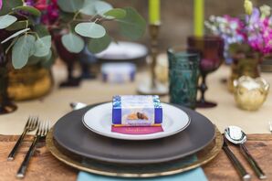 Place Settings with Gold Accents and Wedding Favors