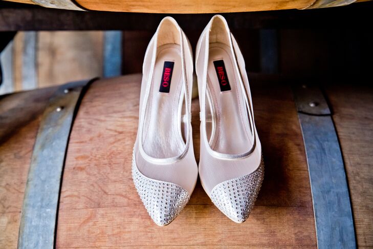 Joanne wore a pair of Beso white heels that had an illusion material, with a pointed toe that was accented in rhinestones.