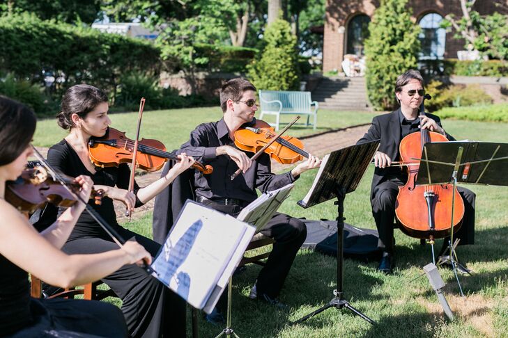 To set the tone, the Vogue Music String Quartet performed as guests arrived and throughout the ceremony. Tim and the wedding party made their entrance to “All of Me” by John Legend, while Canon D served as the sound track for the bridal processional.