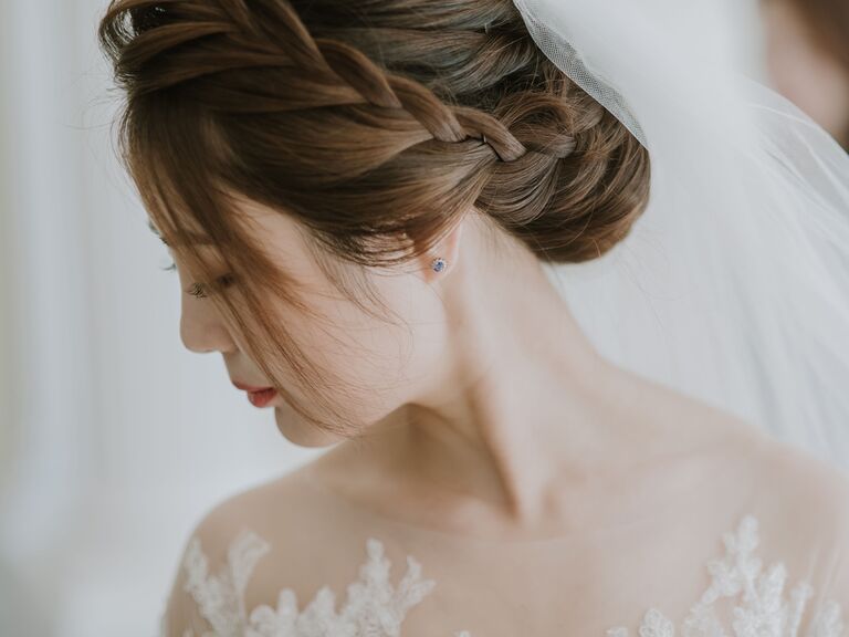 wedding updo bun with braid crown