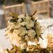 White Bouquet Centerpiece With Gold Garland