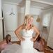 Kristine wore a strapless ivory wedding dress that flared at the bottom. "I did add a belt to add some sparkle!" she says.