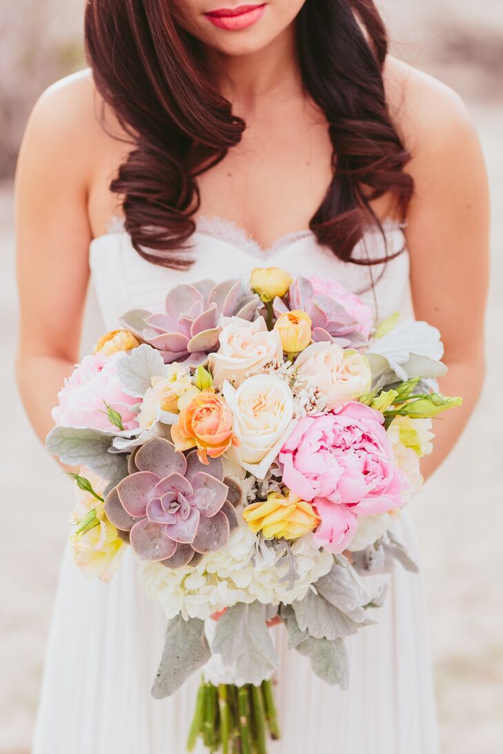 Mai held a beautiful bouquet filled with pastel-colored flowers and plants, ranging from ivory roses to pink peonies and purple succulents.