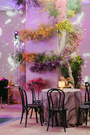 Cocktail Table, Textured Linens Under Pillar With Ascending Colorful Flowers