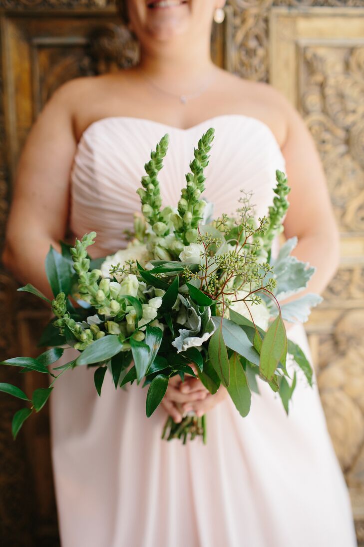 All the bridesmaid bouquets were monochromatic but mismatched. All Claire knew was she wanted different shades of white so they popped against the blush dresses. Brianna from Fox & Fern Floral used a mix of eucalyptus, roses, scabiosa, jasmine, sweet peas, dusty miller, clematis and dahlias to make each bouquet different.