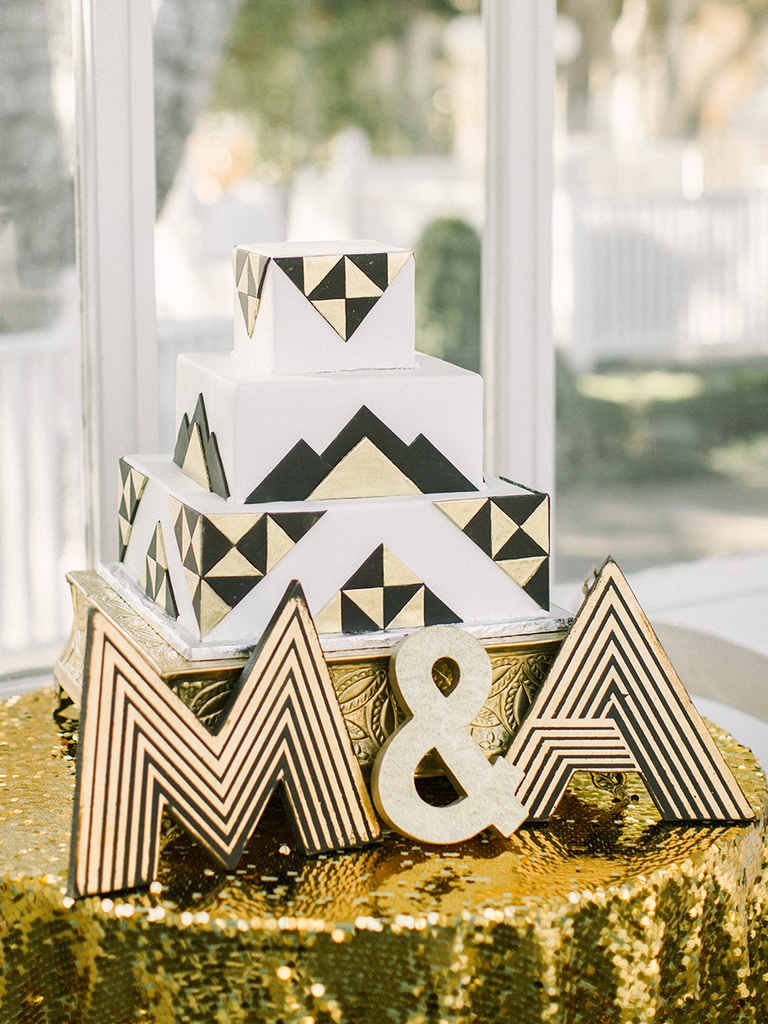 Art deco style gold and black wedding cake