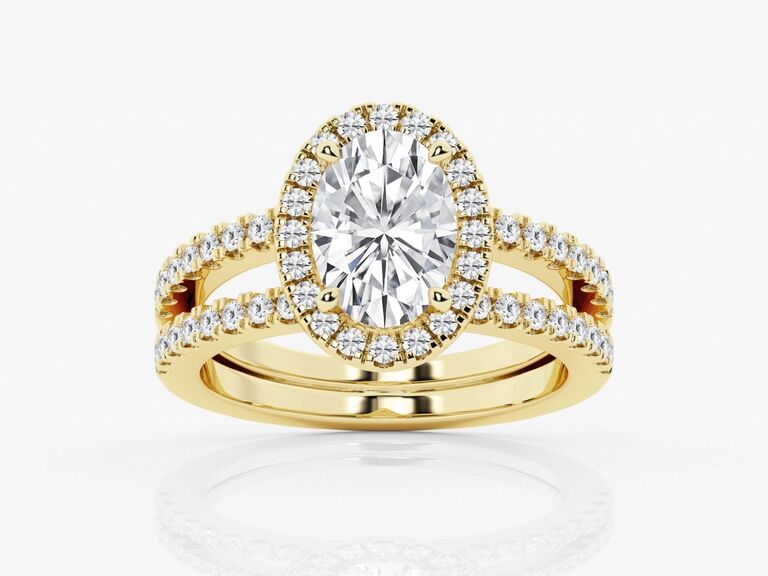 double halo oval-cut engagement ring with a double shank in gold