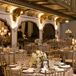 The wedding color palette consisted of navy, gold and ivory. “We went heavy on the candlelight in the reception space to give a very romantic and soft look," the bride explains.