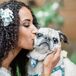 Bride Kissing Pug During Wedding at Serendipity Gardens in Oak Glen, California