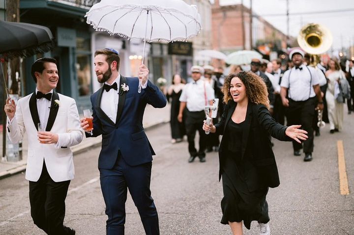 A wedding content creator capturing iPhone content at a wedding