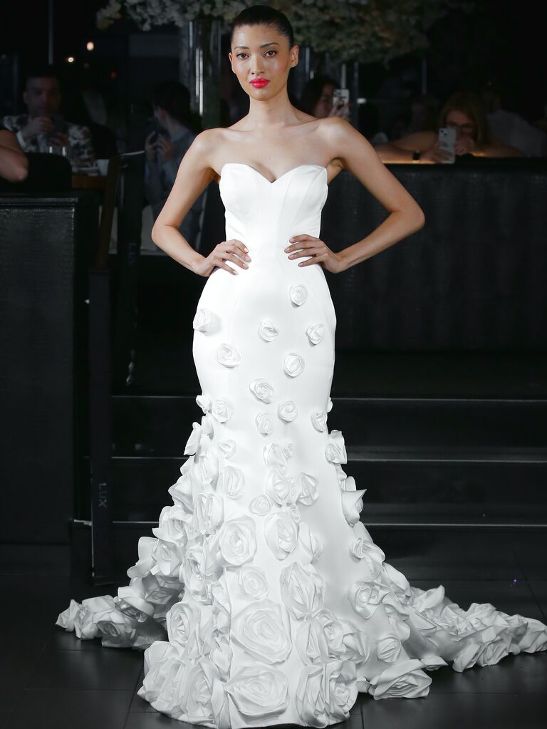 Strapless floral gown by Madeline. 