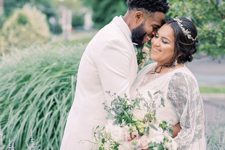 couple sharing embrace on wedding day