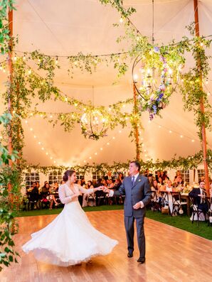 Bride and Groom Twirl Around the Dance Floor