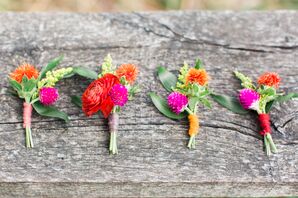 Ranunculus and Thistle Hot Pink Boutonniere