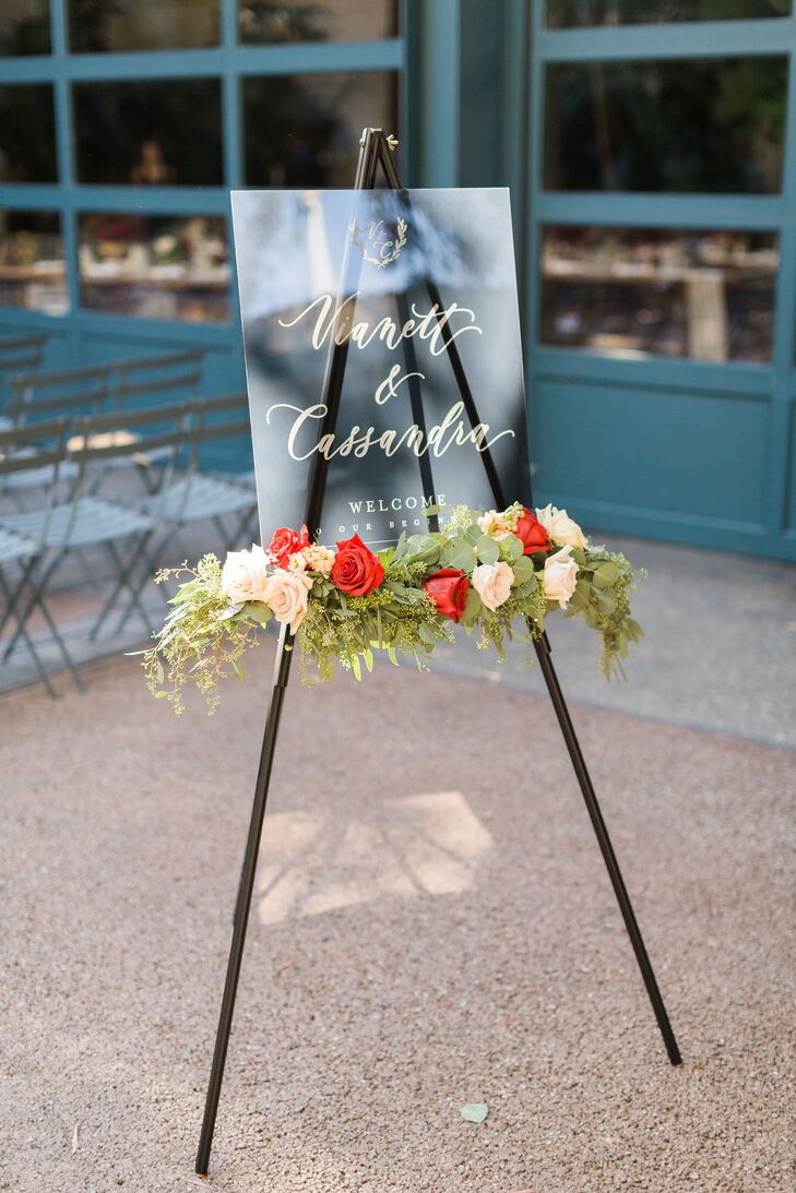 Modern Welcome Sign on Easel with Flowers and Elegant Calligraphy