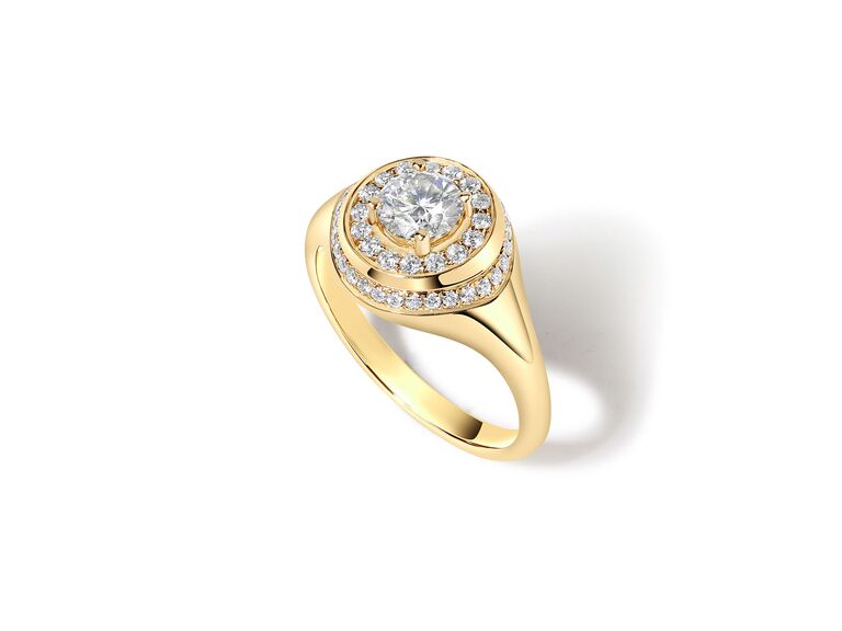 yellow gold signet ring with diamond center stone 