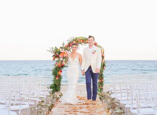 Kelsey White and Nick Heitz had a casual yet elegant wedding at Gulf Stream Bath and Tennis Club. A fun invitation suite introduced the wedding's trop